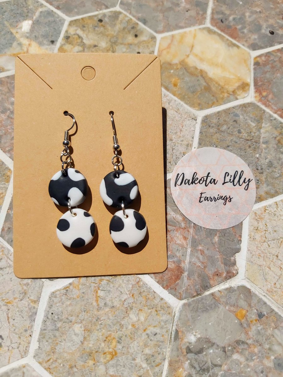 Double drop cow print polymer clay earrings