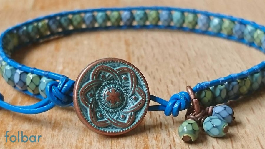 Blue leather bracelet with snakeskin effect beads