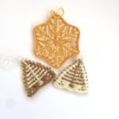 Yellow hand knit Christmas decorations 
