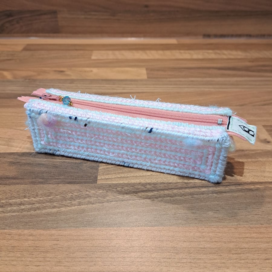 Pencil case - light pink and light green with pink zip, blue charm, and bobbles