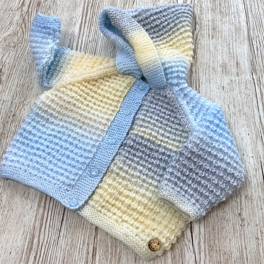 Hand knitted Baby Hoodie in pastel shades to fit 6 - 12 months
