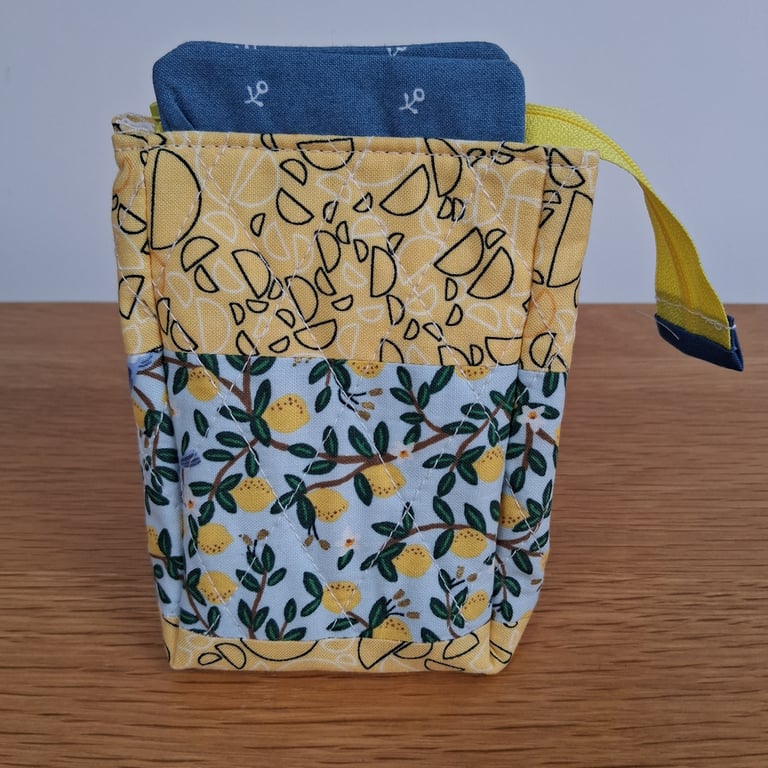 Lemons on yellow quilted zipped pouch