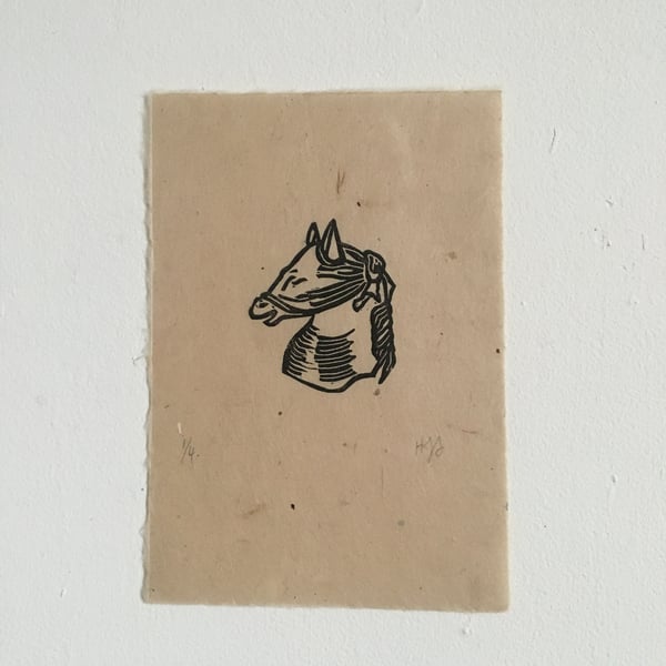 Blinfdolded Horse, linocut print on handmade paper
