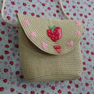 Straw bag hand embroidered with a juicy strawberry and cute hearts