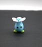 blue glass flower head figure