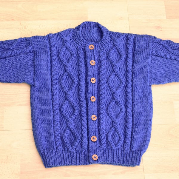aran style toddlers handknitted cardigan