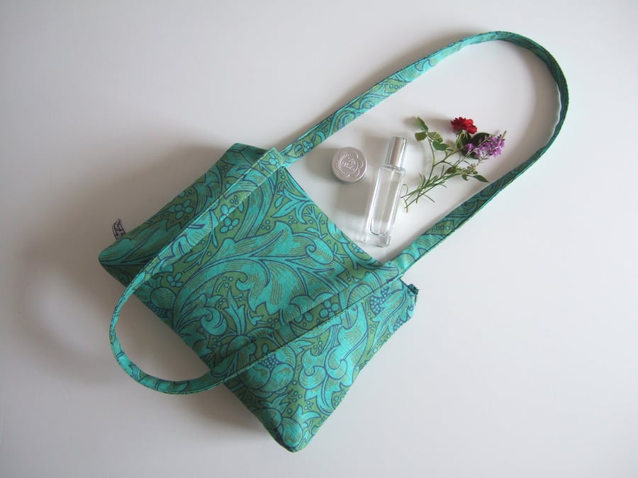 Shoulder bag or handbag in a green William Morris print, with chunky zip