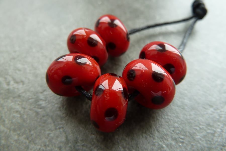 red and black spots lampwork glass beads