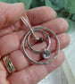 Circles Necklace. Recycled Sterling Silver Pebble with Carnation and Garnet - Image 3