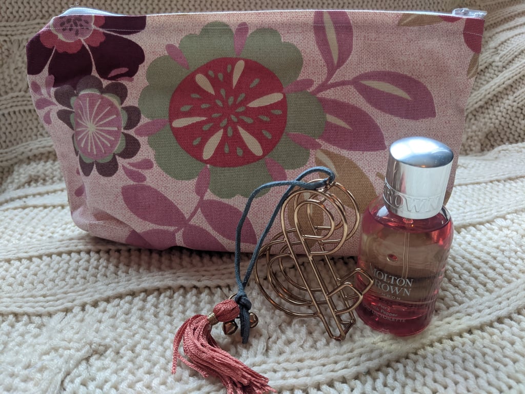 Makeup bag with mid-century-style floral pattern
