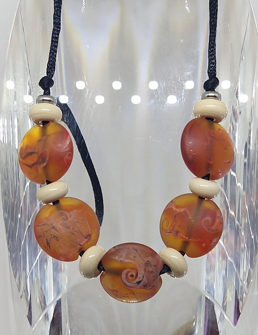 Amber and coral organic lentil bead lampwork necklace