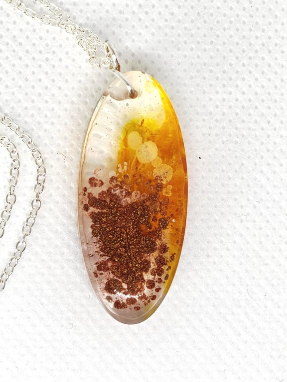 Golden Burst Resin Necklace: Handmade Amber Glow Pendant, Copper Sparkle