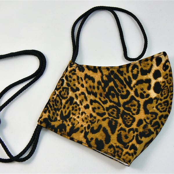 Face mask with removable nose wire , filter pocket  and drawstring toggle 