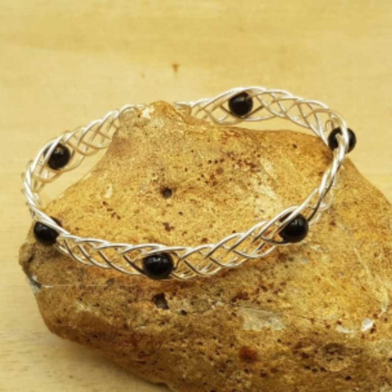 Celtic weave Black tourmaline cuff bracelet. October birthstone.