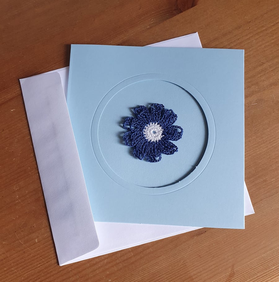 BLUE CARD, BLUE & WHITE FLOWER TO CENTRE - 13CM SQUARE - BLANK FOR YOUR MESSAGE