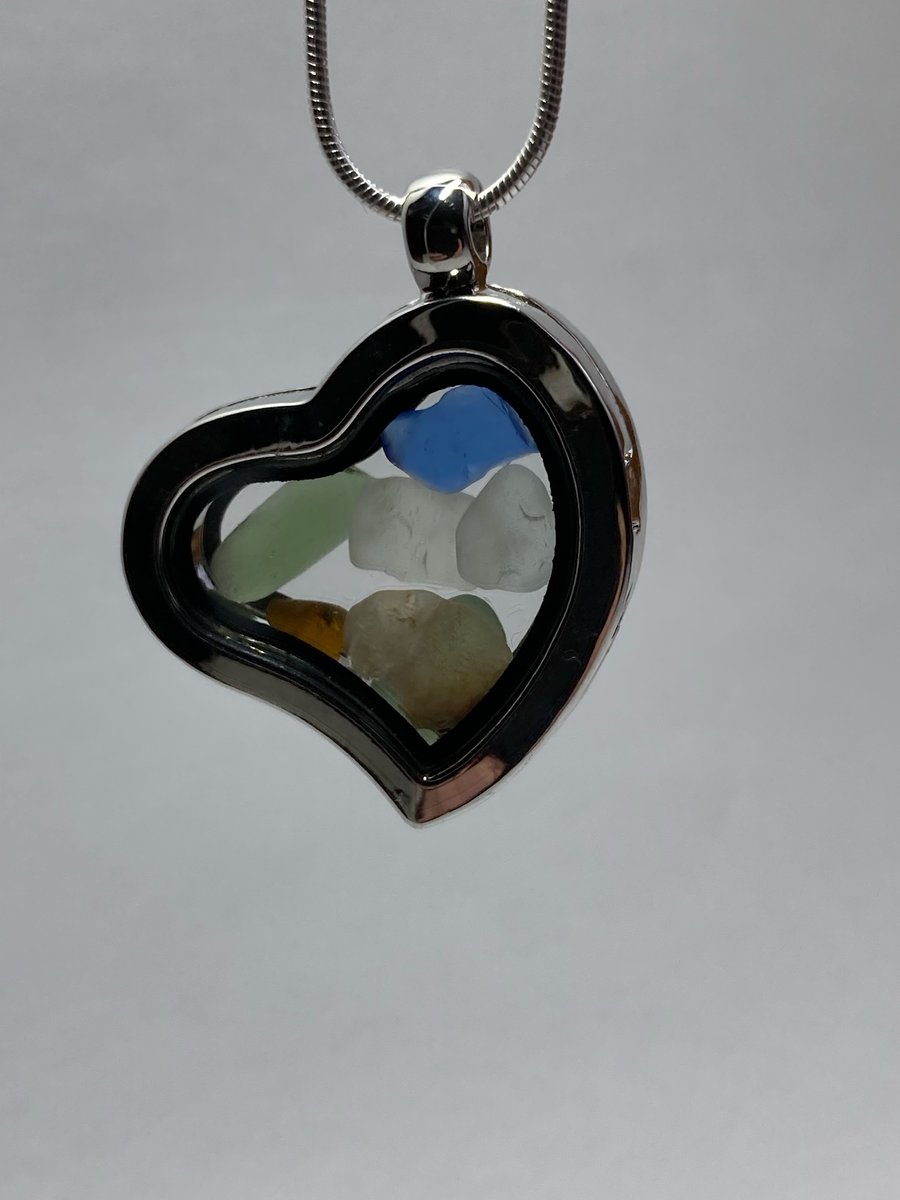 Seaglass filled heart shaped locket on 18in silver plate snake chain