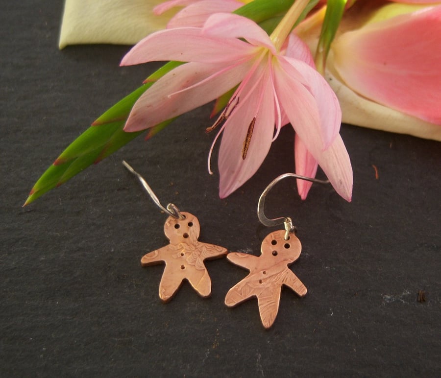 Gingerbread men earrings from recycled coinage