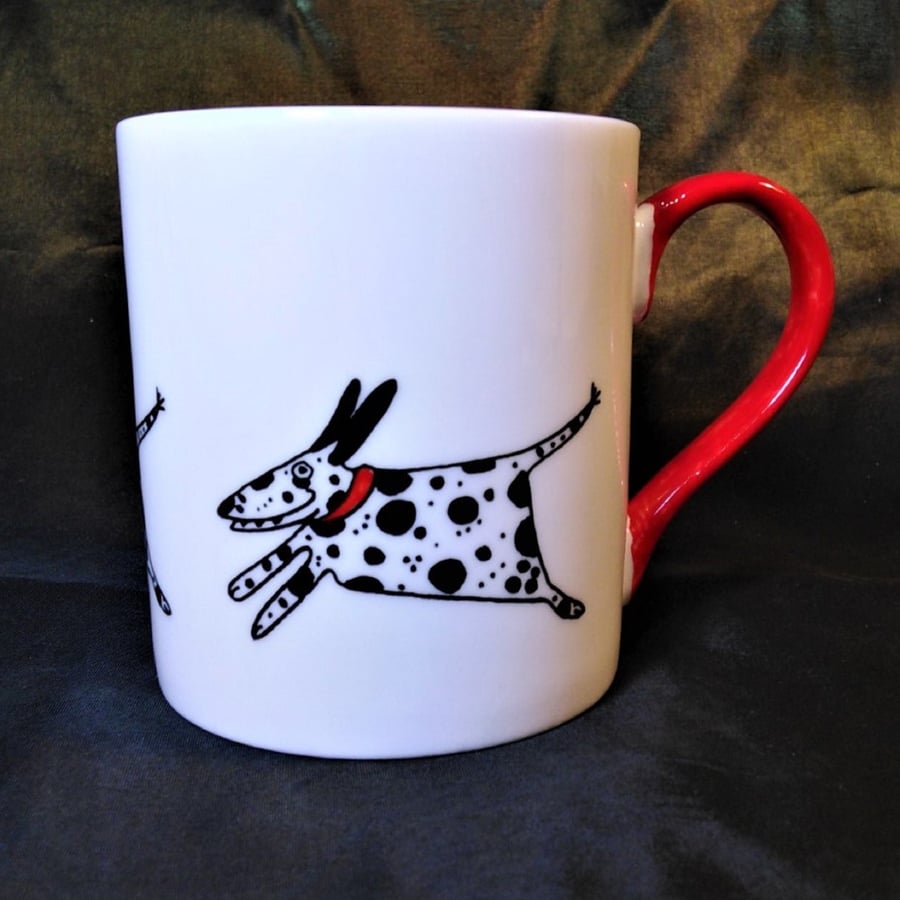 Dalmatians, dalmatians, dalmatians are here playing around on a mug.