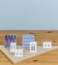 Triangular Corner Display Stand with Grooves for Cards and Jewellery in Retail - Image 2