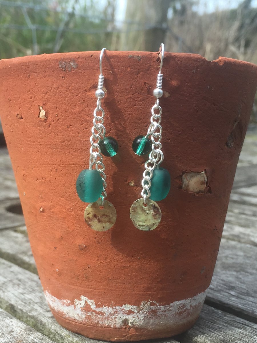Green glass and shell earrings