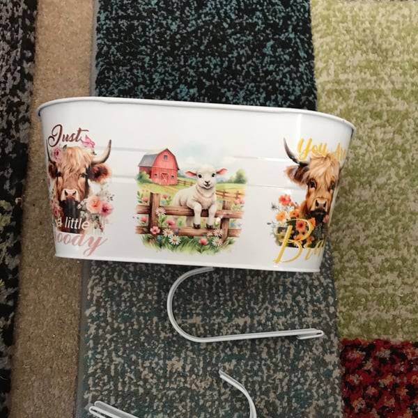 White fence planter with highland cows and lamb super cute motif