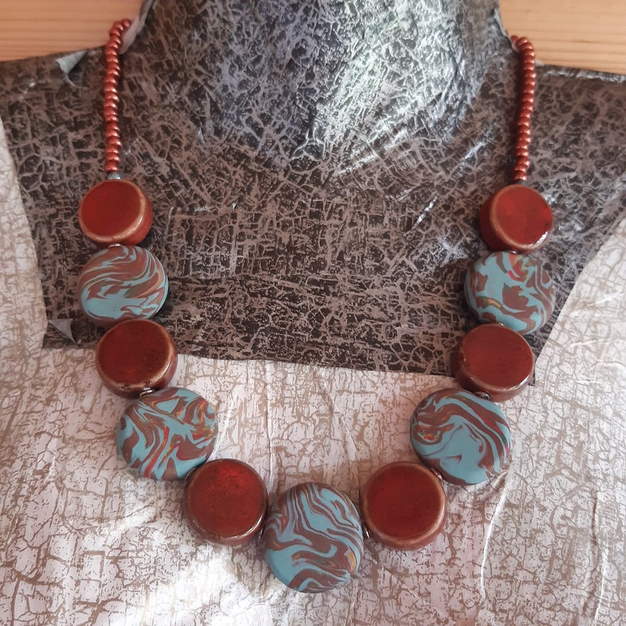 Teal and sienna disc shaped necklace