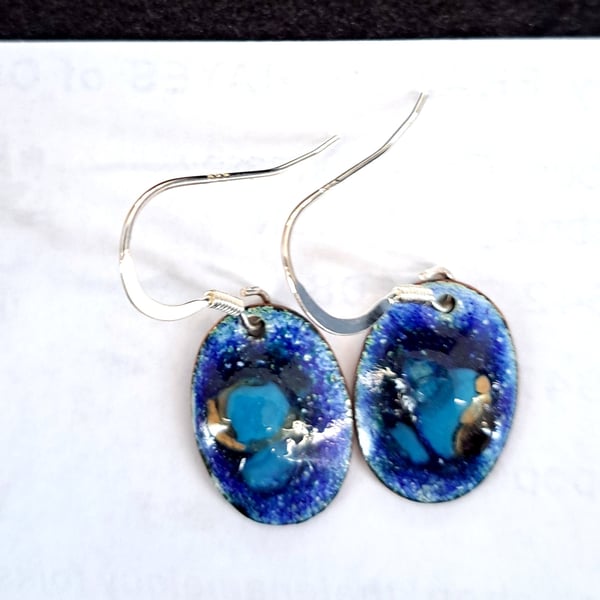 earrings - small oval blue glass lump on blue enamel, silver wires