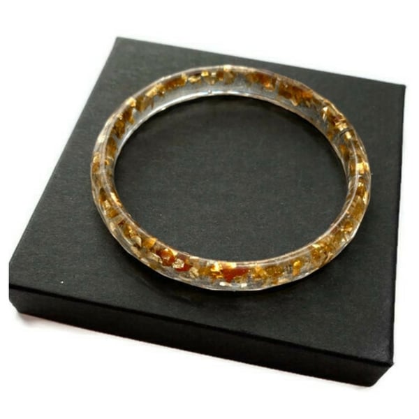 Gold bangle, gold mineral flakes set in clear resin