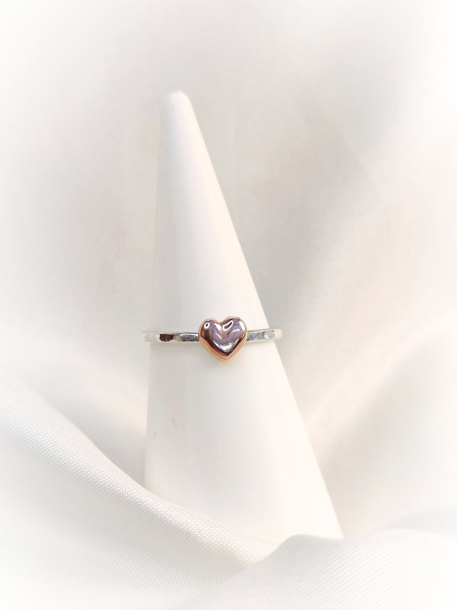 Silver ring with copper heart