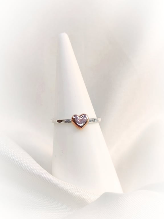 Silver ring with copper heart