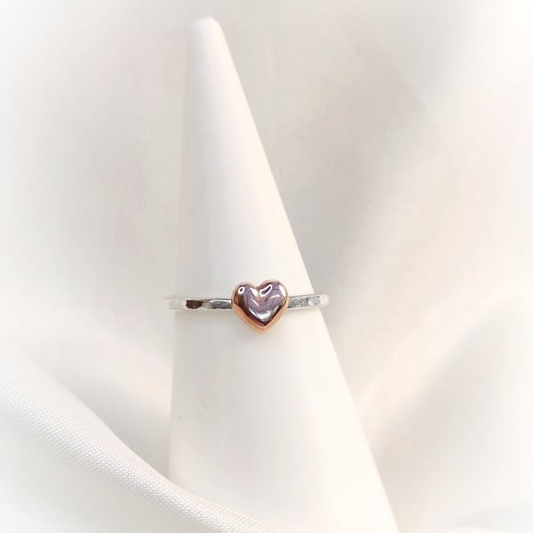Silver ring with copper heart