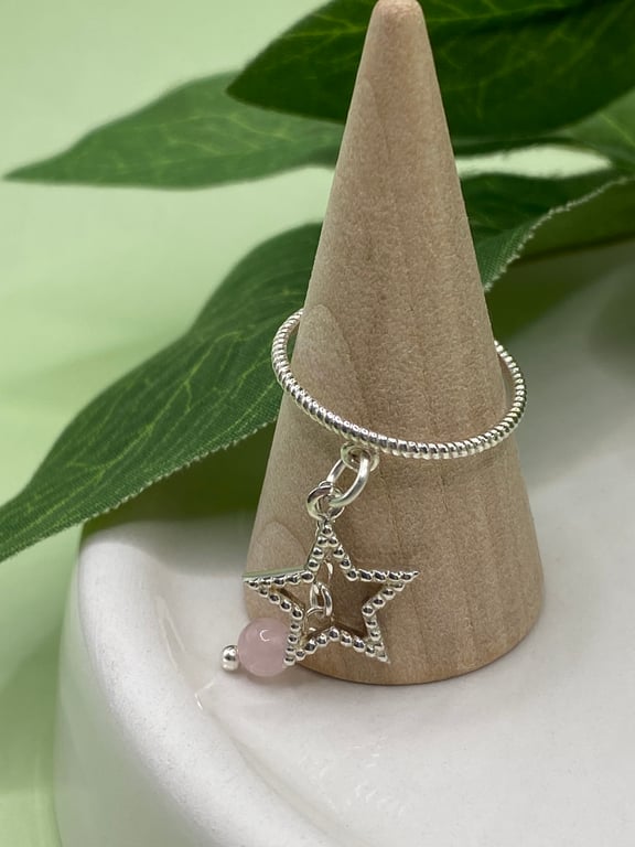 Textured sterling silver ring with star charm