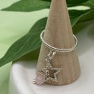 Textured sterling silver ring with star charm