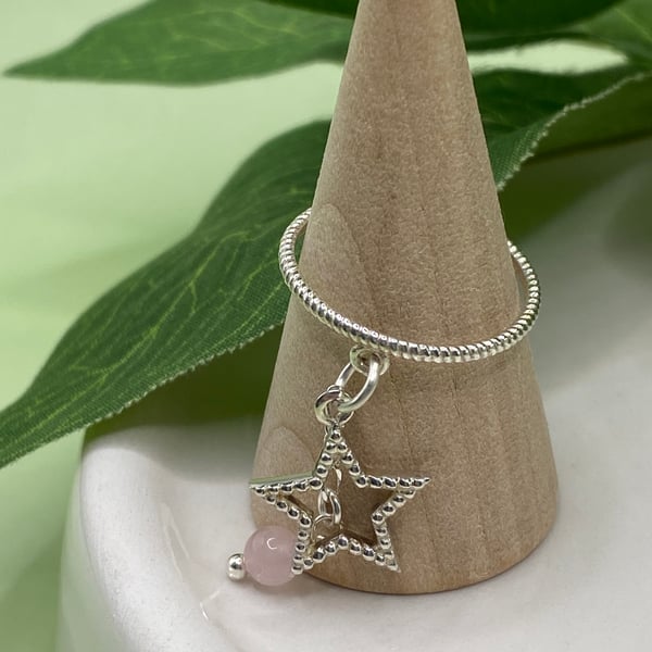 Textured sterling silver ring with star charm