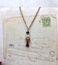 Small crystal Nutcracker pendant in classic red and green christmas jewellery - Image 5