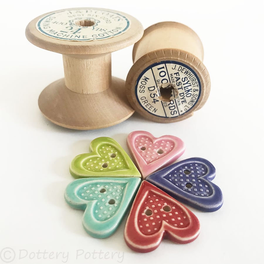 Set of five heart shaped ceramic handmade buttons