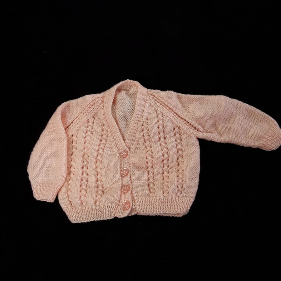 Hand knitted baby girls cardigan in peach 1 2 Folksy