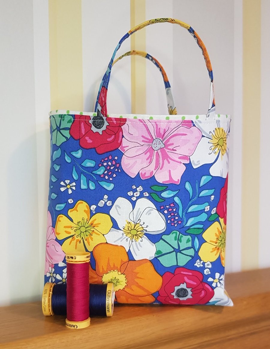 Reusable fabric gift bag, floral design on blue