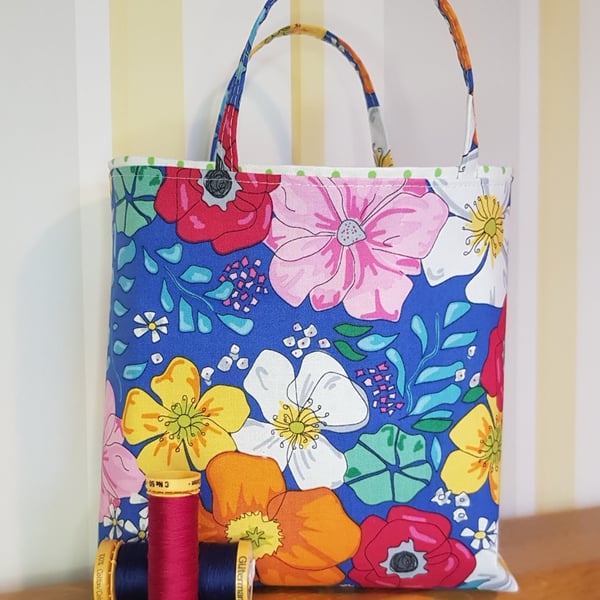 Reusable fabric gift bag, floral design on blue