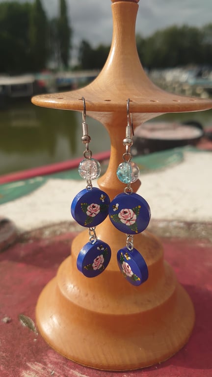 Blue double dangle rose and castle earrings 