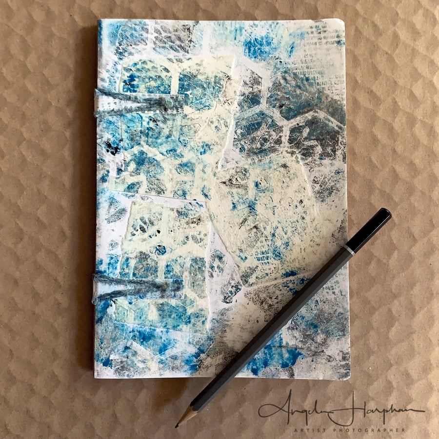 A5 Eco Sketch Book Hand Stitched with Collaged Monoprints Front Cover in Cyan. 