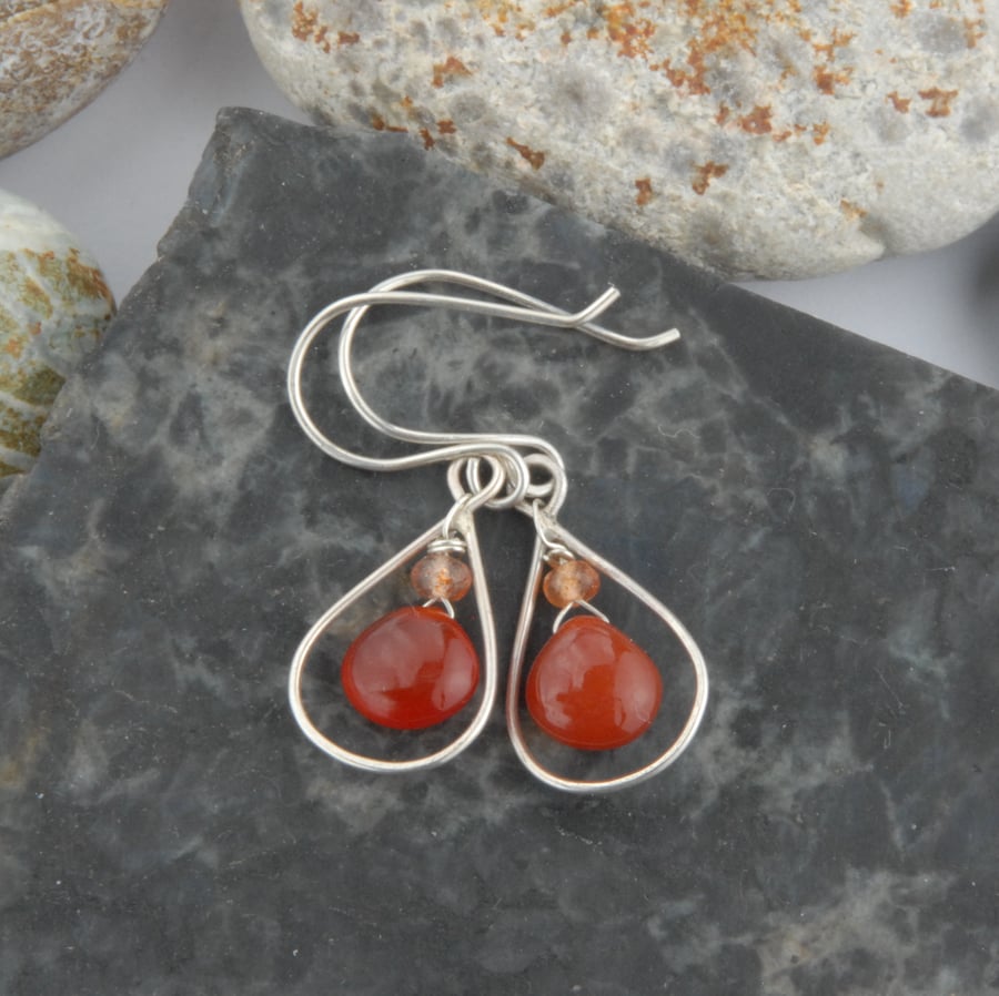 Sterling silver and deep orange carnelian frame drop earrings