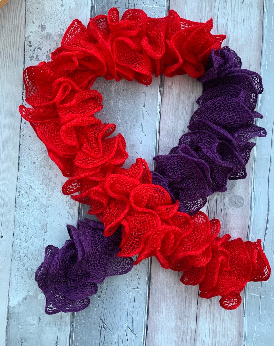 Knitted frilly scarf , block colour , red, purple 