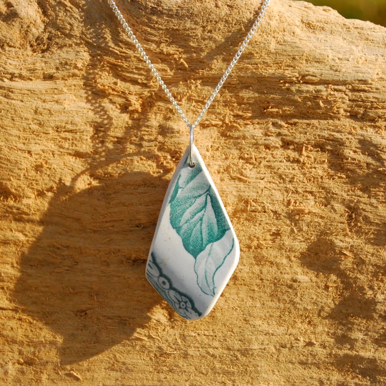 Sea pottery pendant with leaves