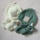 Hand knit top knot hat and bootie set 