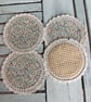 Set of four floral coasters with crochet edge. - Image 3