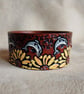 Handmade Leather Bracelet with a Surreal Design. Dolphins and Sunflowers - Image 3