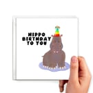 Hippopotamus birthday card with a hippo wearing a party hat