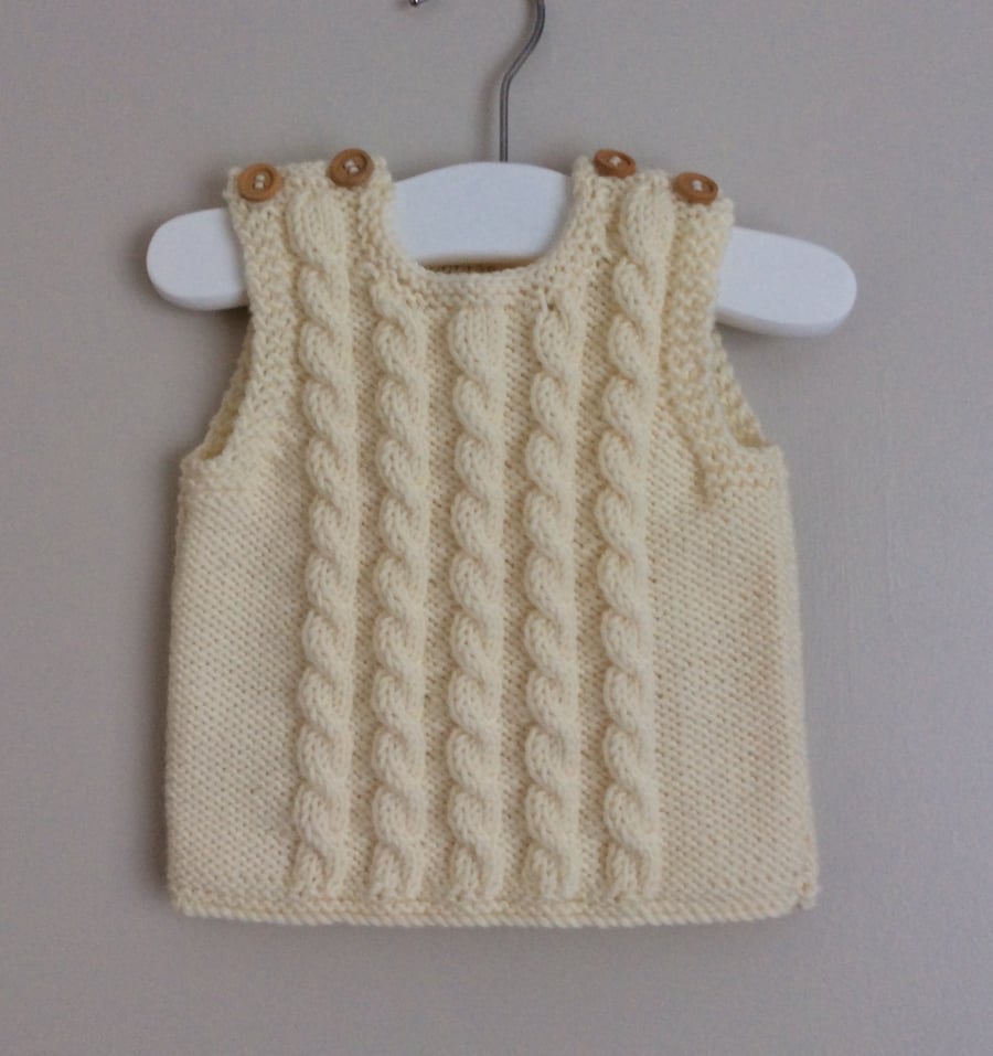 Hand knitted merino wool sleeveless baby jumper 