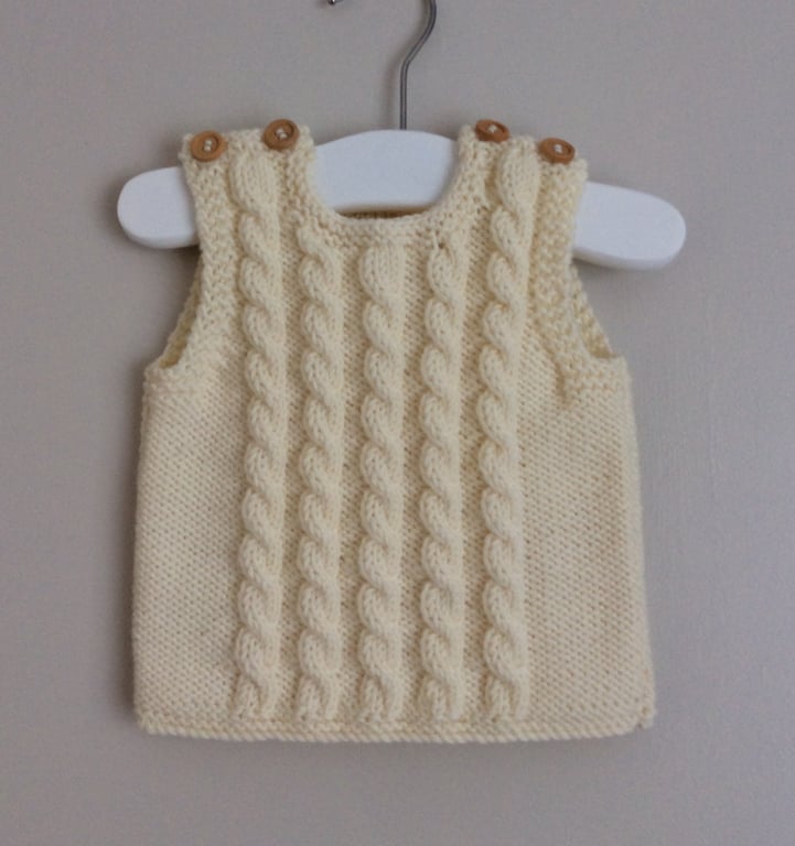 Hand knitted merino wool sleeveless baby jumper 